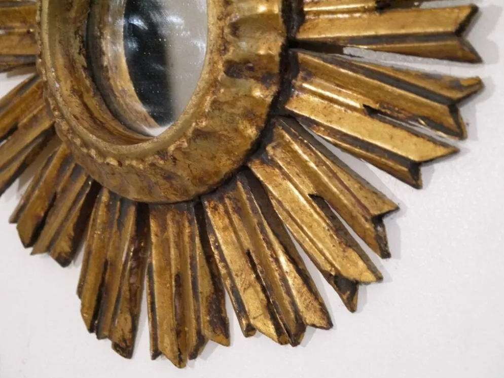Miroir soleil en bois doré 1950