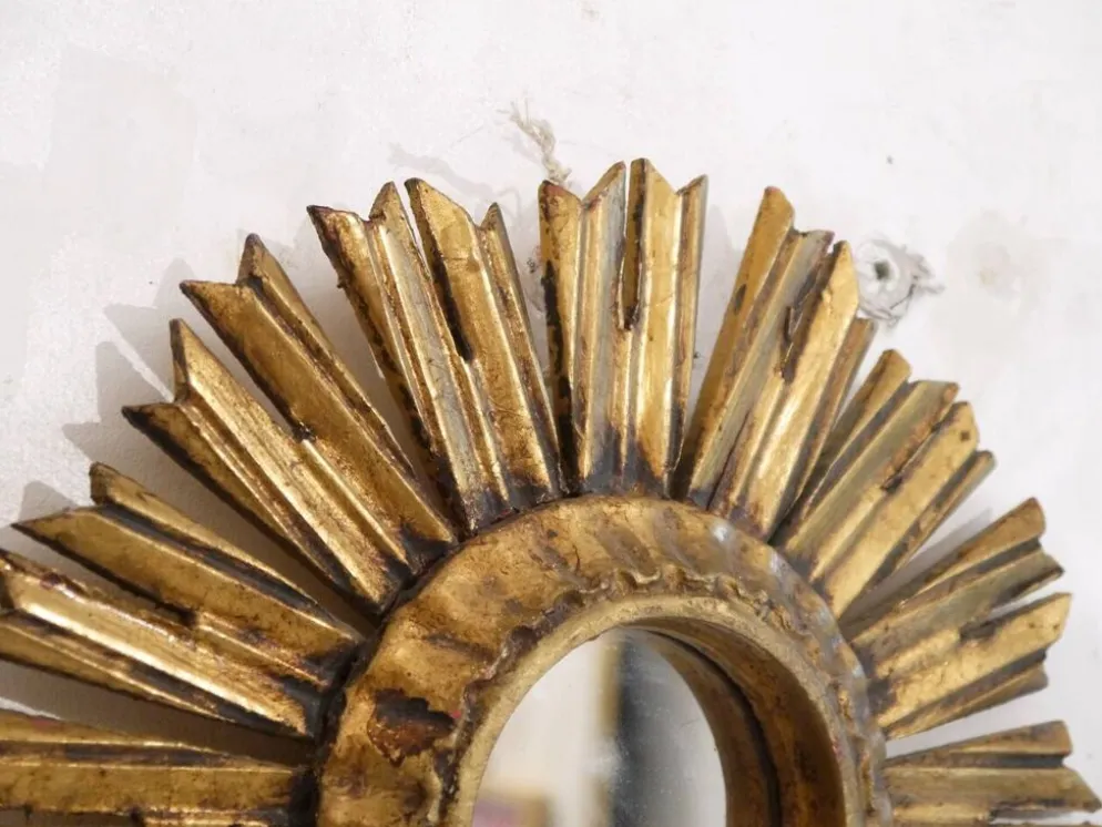 Miroir soleil en bois doré 1950