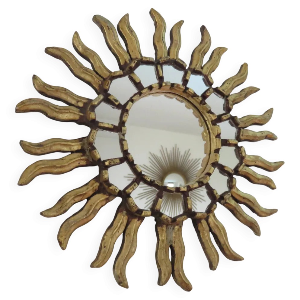 Miroir soleil en bois doré avec incrustations début XXème