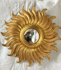 Miroir soleil en bois doré des années 90