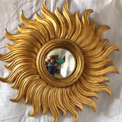 Miroir soleil en bois doré des années 90