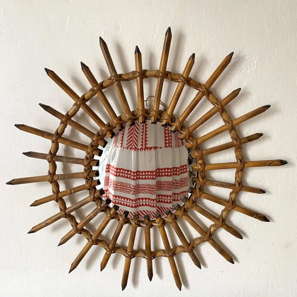 Miroir soleil en rotin années 60-70