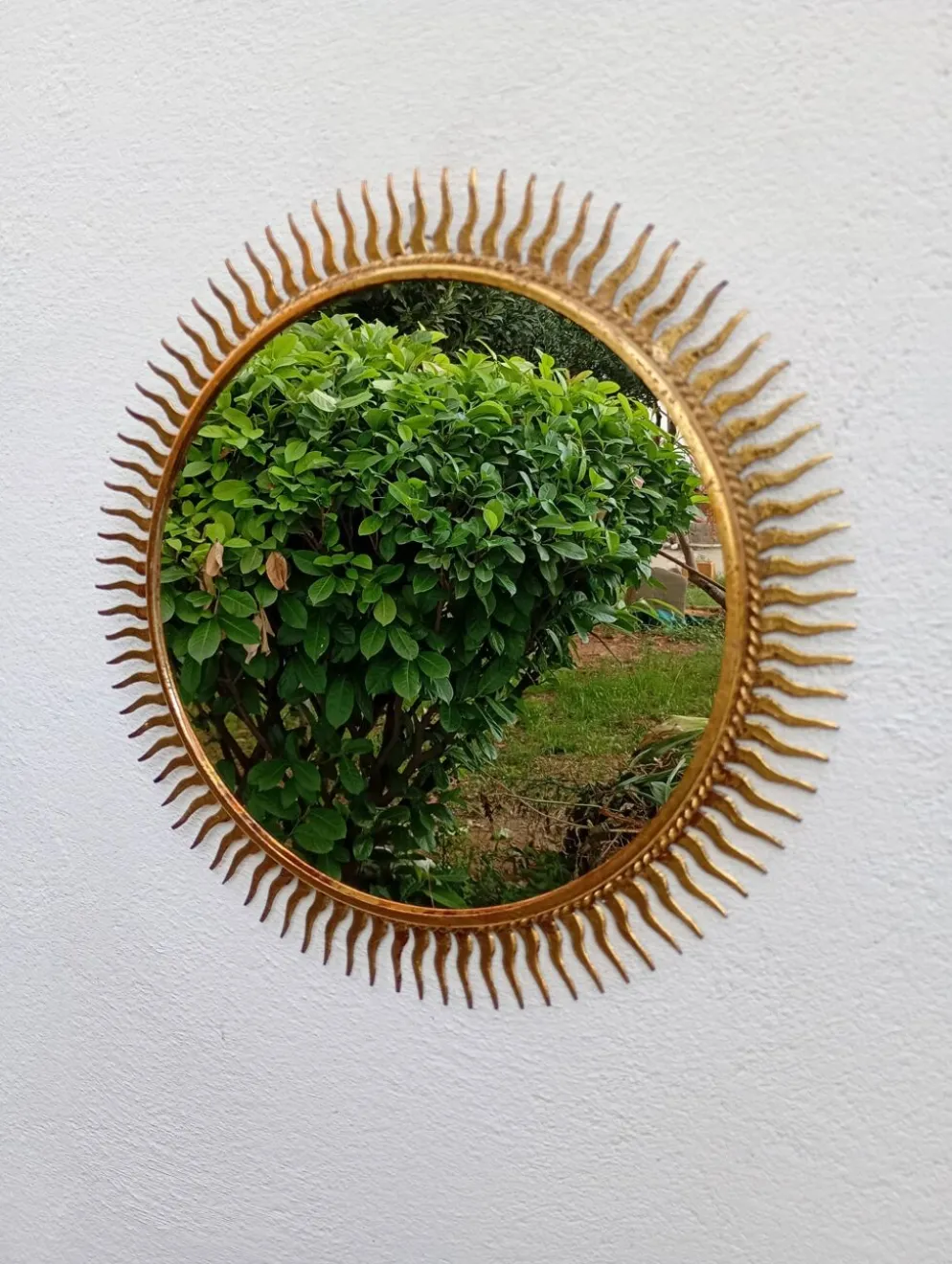Miroir soleil vintage doré en métal – style années 60/70