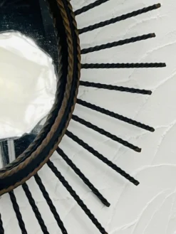 Miroir soleil vintage en métal noir et doré années 60