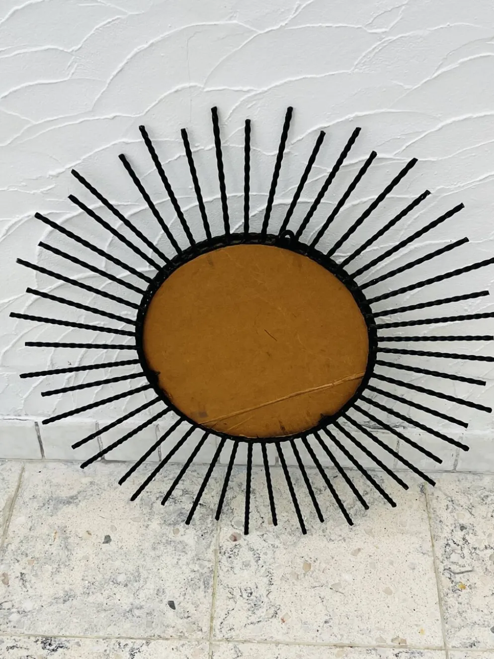 Miroir soleil vintage en métal noir et doré années 60