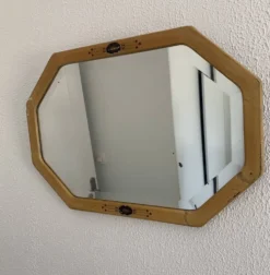 Miroir vintage 1930 Art Déco biseauté octogonal bois stuc - 66 x 45 cm