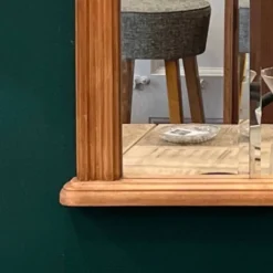 Miroir vintage avec cadre en bois sculpté