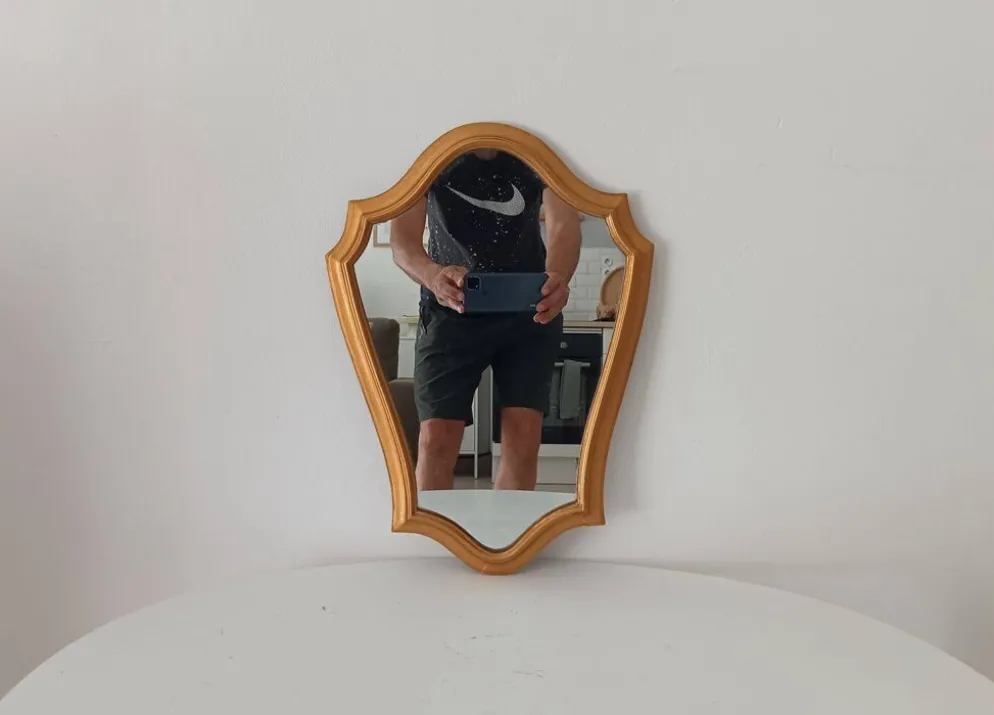 Miroir vintage baroque en bois doré