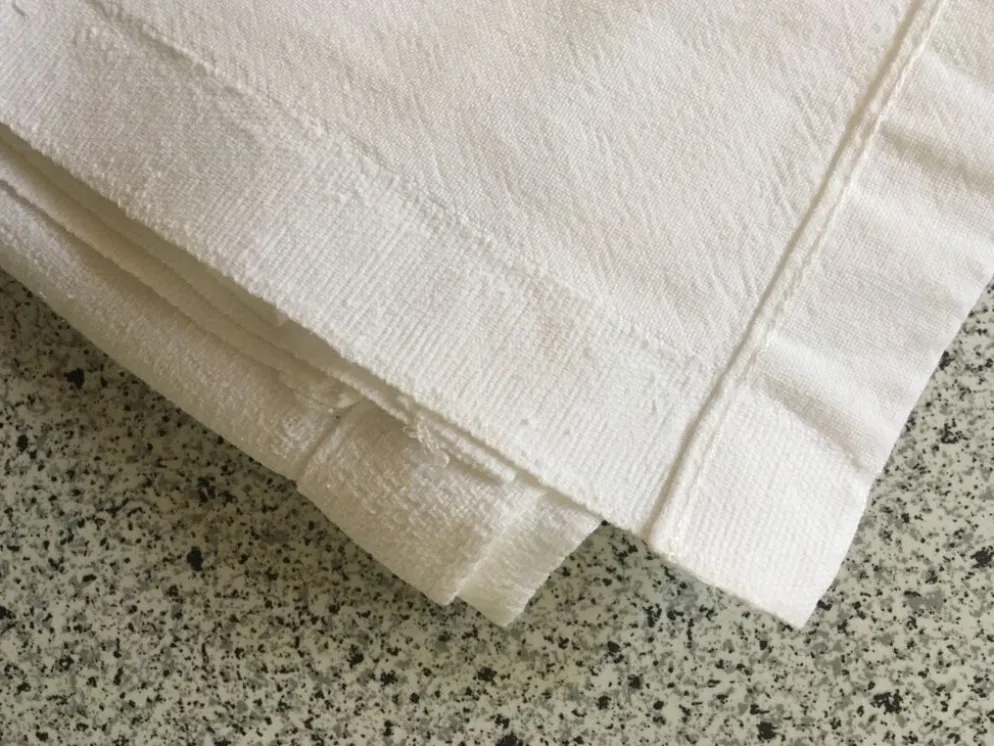 Nappe damassée 160 x 130 motif rectangle