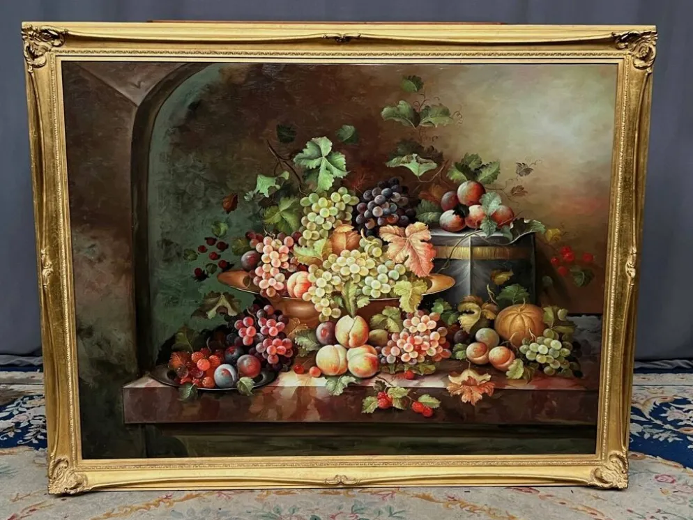 Nature morte avec fruits. Huile sur toile. Signé.