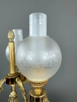 Paire de candélabres à trois lumières en bronze, XXe siècle