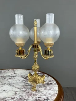 Paire de candélabres à trois lumières en bronze, XXe siècle