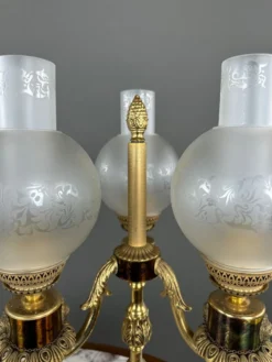 Paire de candélabres à trois lumières en bronze, XXe siècle