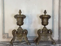 Paire de chenets de style Louis XIV en bronze d’après un dessin de André-Charles Boulle