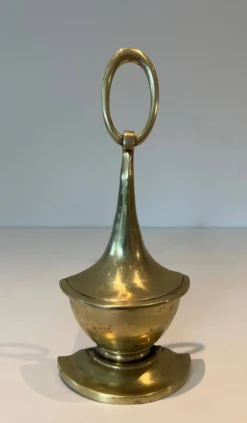 Paire de chenets en bronze de style néoclassique en forme de lampe à huile