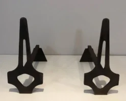 Paire de chenets modernistes en acier et fer forgé