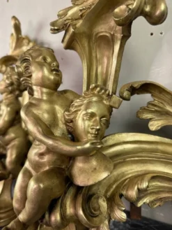 Paire de chenêts en bronze ciselé et doré d'après un modèle de Jacques Caffieri, Paris XIXème