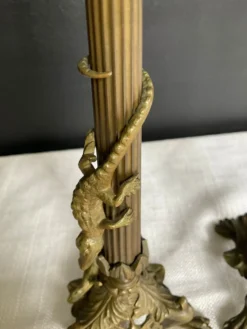 Paire de flambeaux XIXe en bronze doré style empire