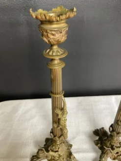 Paire de flambeaux XIXe en bronze doré style empire