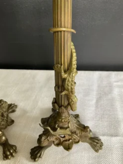 Paire de flambeaux XIXe en bronze doré style empire