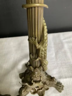 Paire de flambeaux XIXe en bronze doré style empire