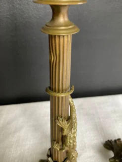 Paire de flambeaux XIXe en bronze doré style empire