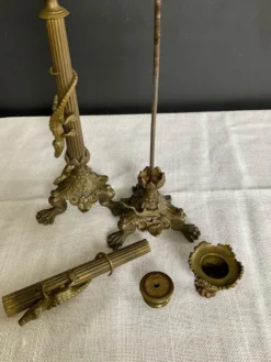 Paire de flambeaux XIXe en bronze doré style empire