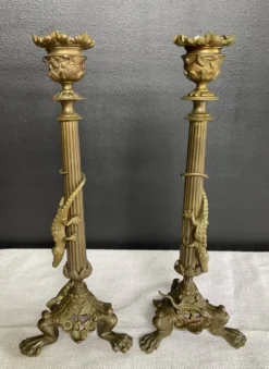 Paire de flambeaux XIXe en bronze doré style empire