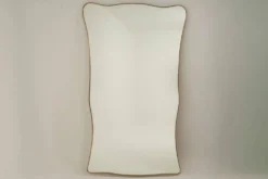 Paire de miroirs dans le style de Gio Ponti. Travail des années 80.