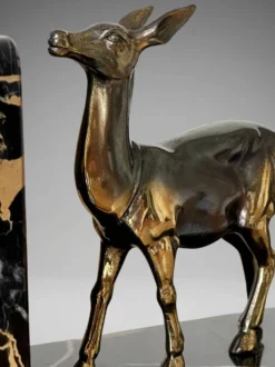 Paire de serre-livres biches en marbre noir et métal doré – Style Art Déco