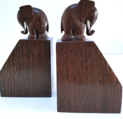 Paire de serre-livres éléphants stylisés bois massif