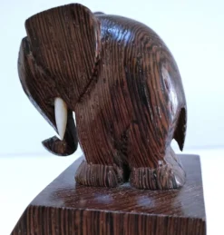 Paire de serre-livres éléphants stylisés bois massif