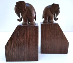 Paire de serre-livres éléphants stylisés bois massif