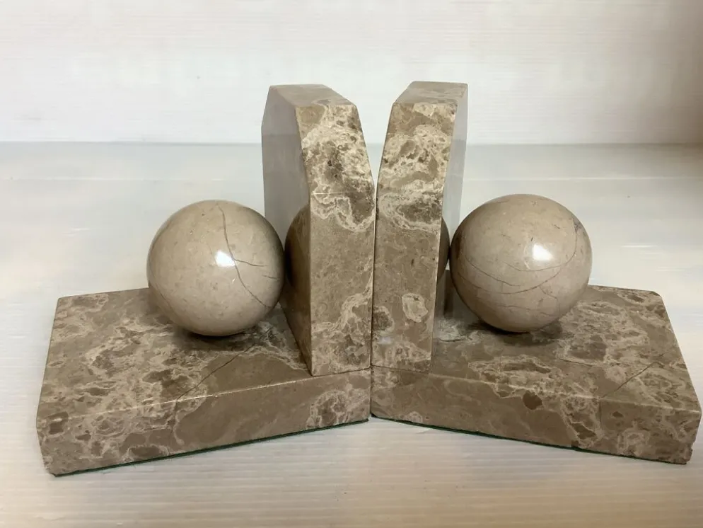 Paire de serres livres boules en marbre beige