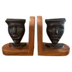 Paire de serres livres masques en bronze