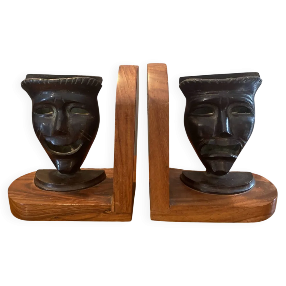 Paire de serres livres masques en bronze