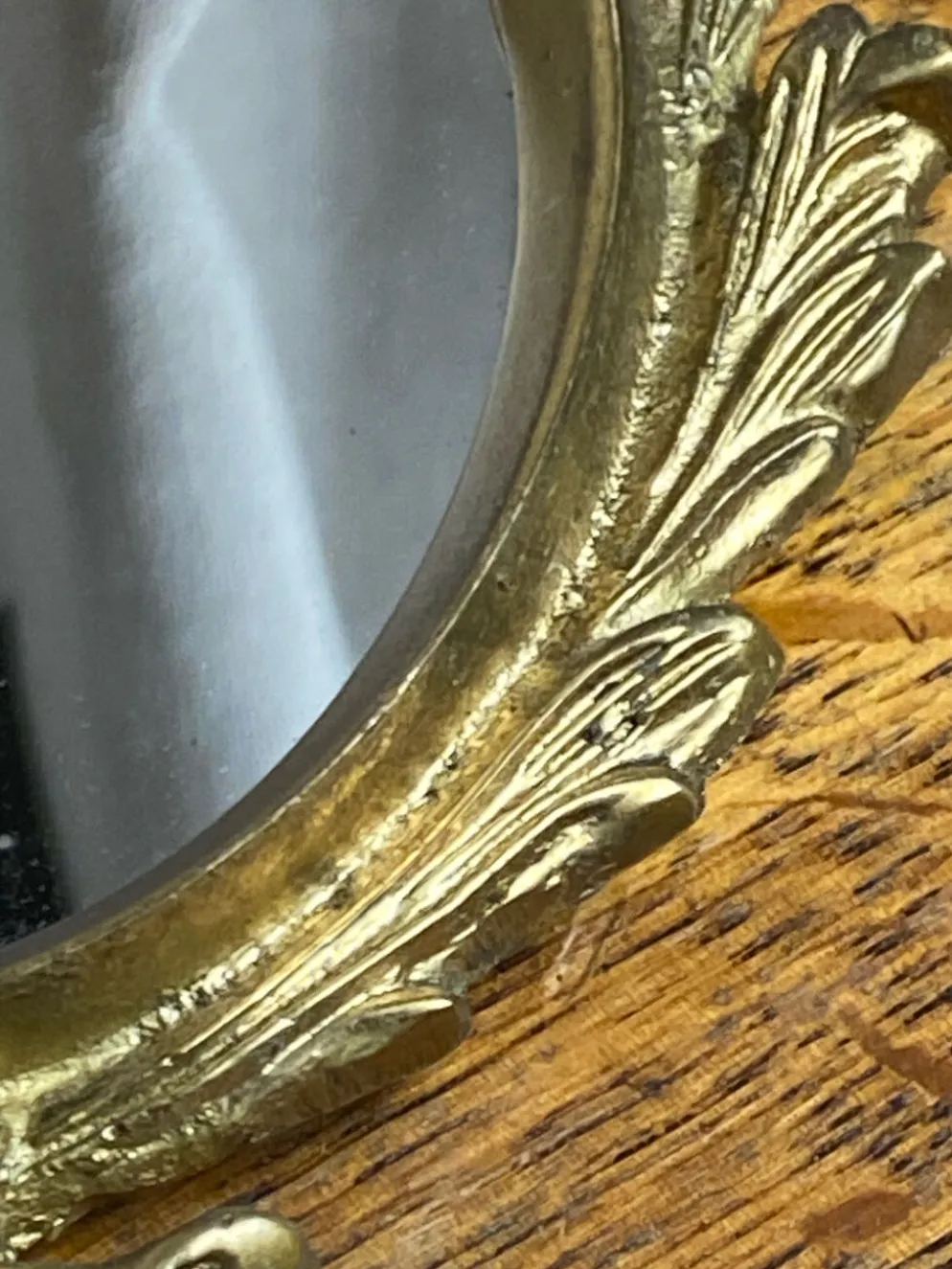 Petit miroir ancien en bronze