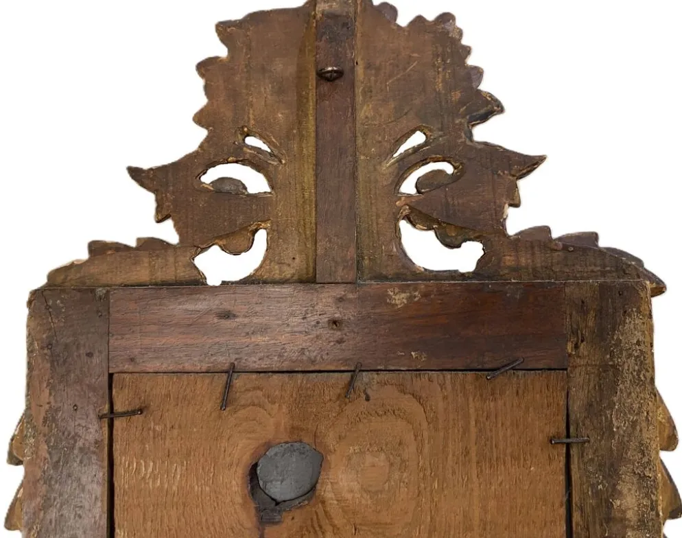 Petit miroir de dame Louis XVI en bois sculpté et doré