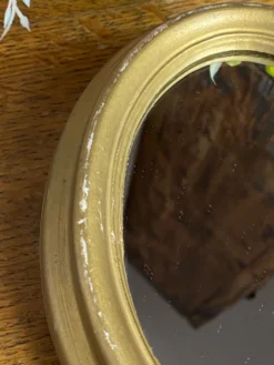 Petit miroir de forme ovale italien