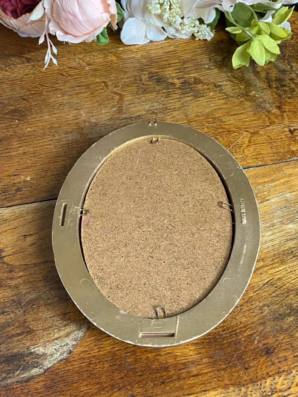 Petit miroir de forme ovale italien