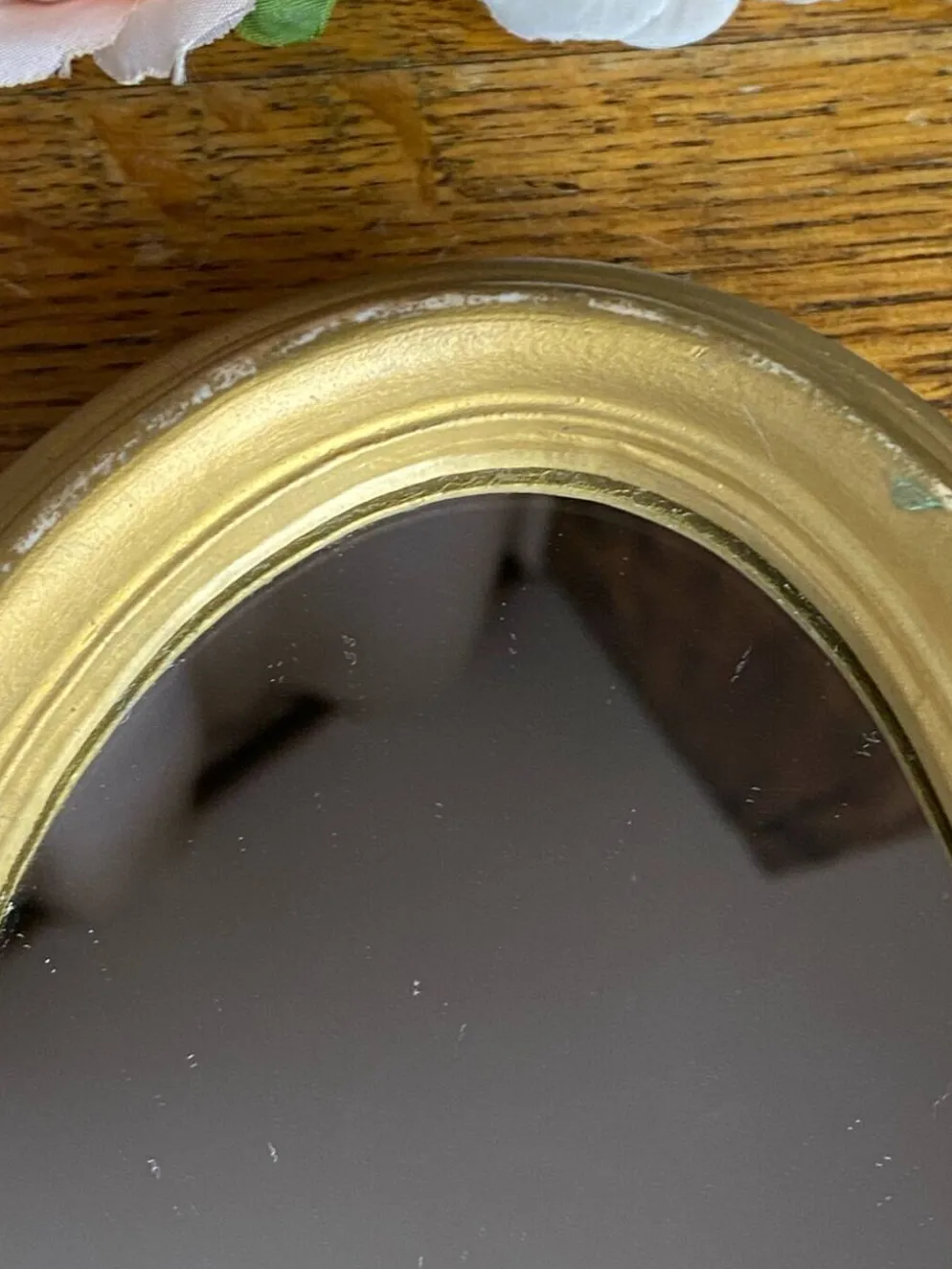 Petit miroir de forme ovale italien