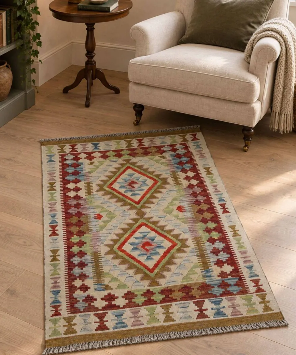 Petit tapis en laine tissé à plat avec un motif géométrique en zigzag pour le salon.