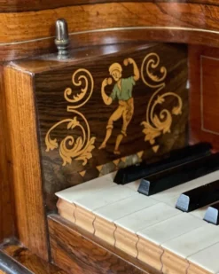Piano table en palissandre et marqueterie de nacre et bois fruitiers vers 1830