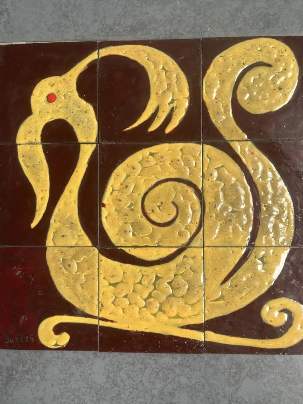 Plaque de céramique motif zoomorphe composée de 9 carreaux