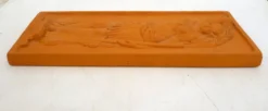 Plaque murale Femme baigneuse, bas-relief en terre cuite