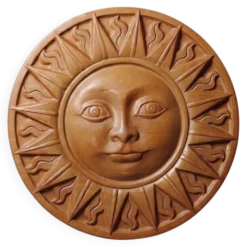 Plaque murale soleil anthropomorphe en terre cuite patinée, Italie 1996