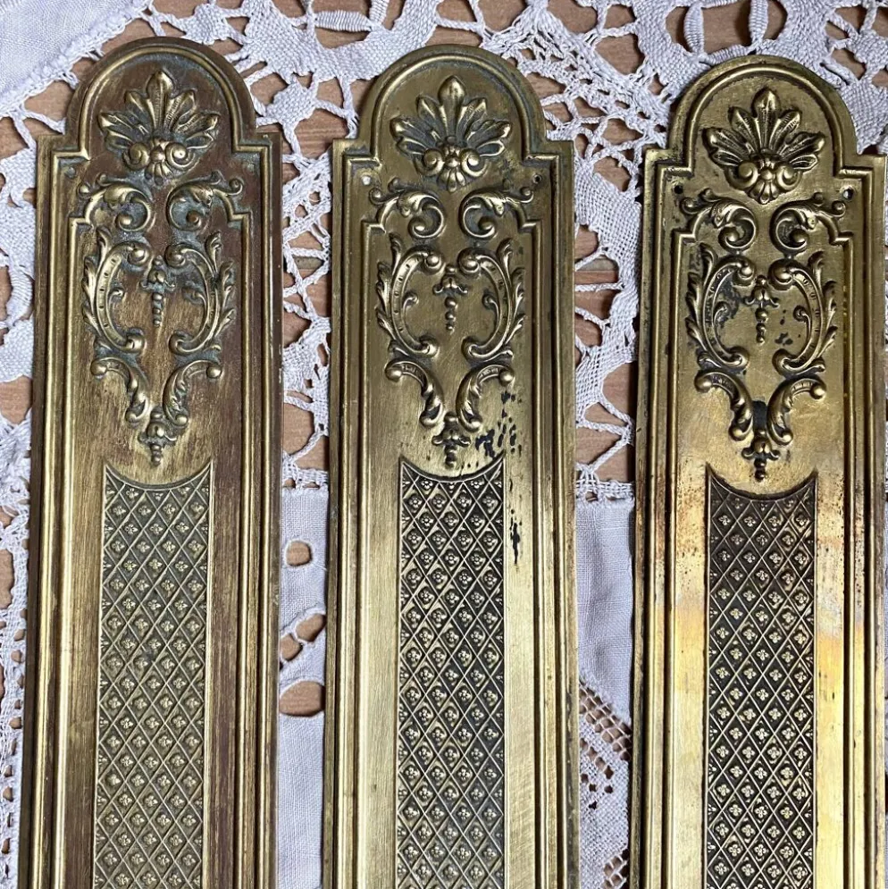 Plaques de propreté anciennes en laiton