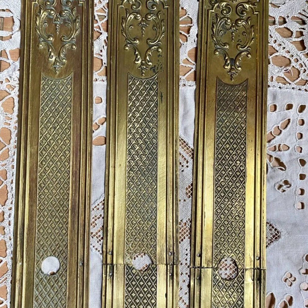 Plaques de propreté anciennes en laiton