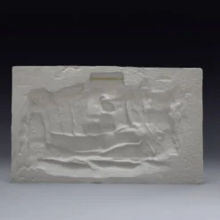 Plâtre représentant deux vaches et un veau, basé sur une fresque égyptienne.