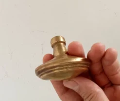 Poignée de porte ancienne en laiton massif doré